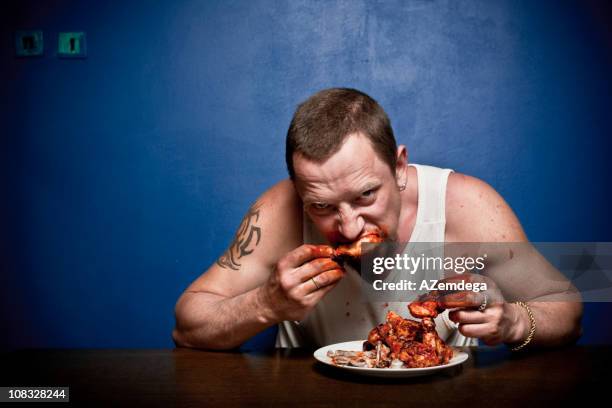 hungry?! - hand chicken wing stock pictures, royalty-free photos & images