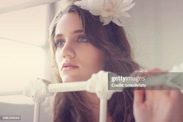 tinted vintage dreaming young woman - beauty editorial stock pictures, royalty-free photos & images