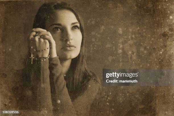 catholic girl vintage photo - rosary beads stock pictures, royalty-free photos & images