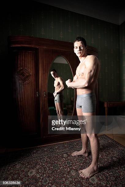 man in the mirror - men underware model stock pictures, royalty-free photos & images