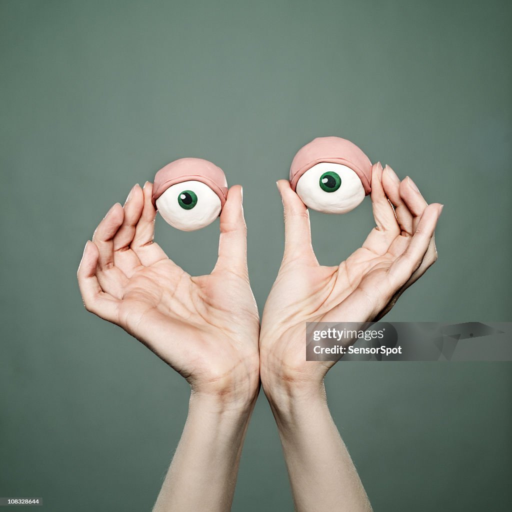 Woman's clay eyes