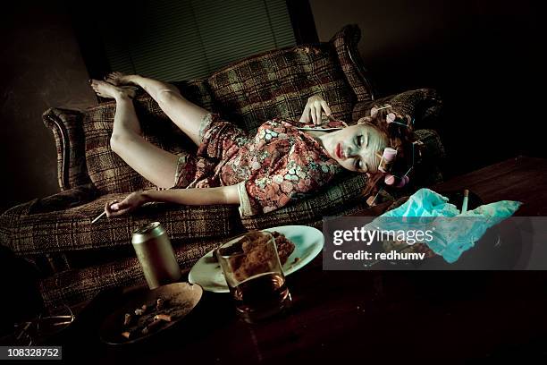 Passes Out Woman Passed Out On Couch Photos and Premium High Res Pictures - Getty ...