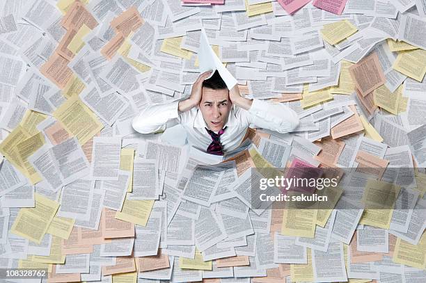 paper flood - workload stock pictures, royalty-free photos & images