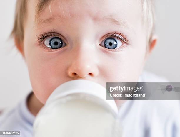 milkman - baby bottle stockfoto's en -beelden