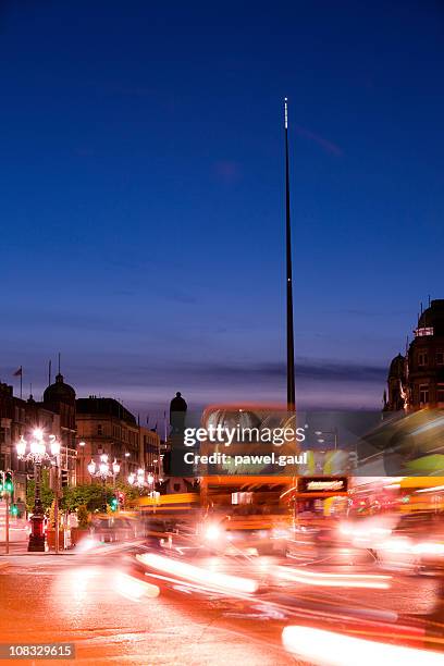 o'connell street by night - dublin bus stock pictures, royalty-free photos & images