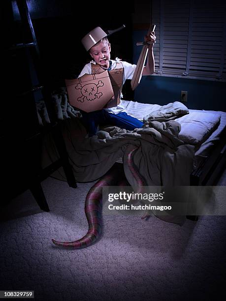 child attacking monster - tentacle stockfoto's en -beelden