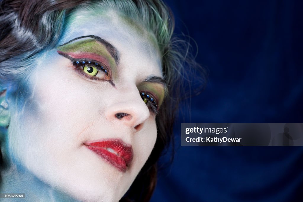 Beautiful Woman In Blue Body Paint High-Res Stock Photo - Getty Images