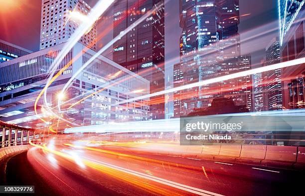 city lights - long exposure traffic stock pictures, royalty-free photos & images
