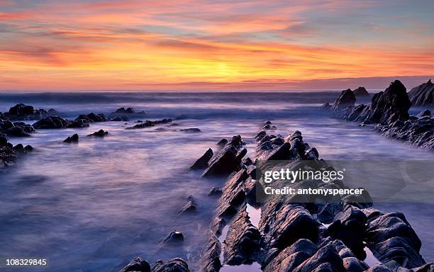 hartland quay, sunset - bude cornwall stock pictures, royalty-free photos & images