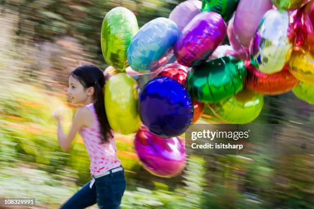 girl and balloons - helium stockfoto's en -beelden