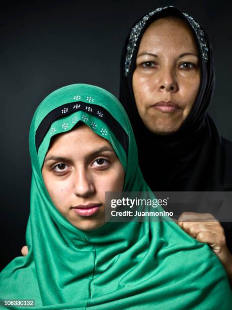 middle eastern mother and her daughter - moroccan girls stock pictures, royalty-free photos & images