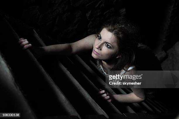 woman walk up the stairs. - bad appearance stock pictures, royalty-free photos & images