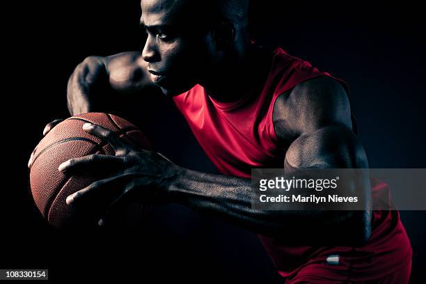basketball player making a move - basketball player close up stock pictures, royalty-free photos & images