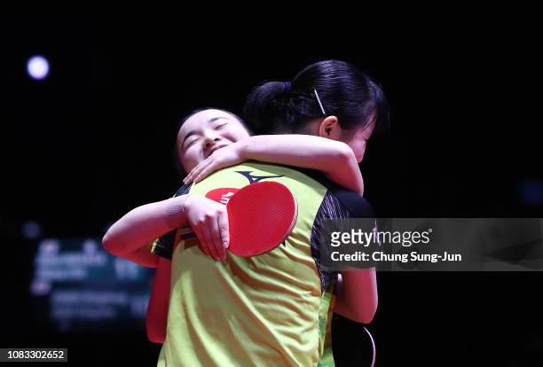 Hina Hayata and Mima Ito of Japan reacts after winning the Women's Doubles - Finals against Chen Xingtong and Sun Yingsha of China during day four of...
