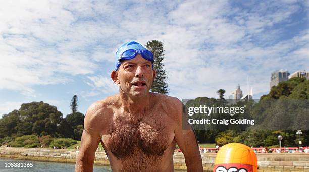 Opposition leader Tony Abbott completes the Body Science Great Australian Swim Series at the Sydney Harbour on January 26, 2011 in Sydney, Australia....