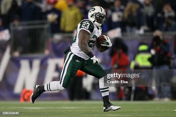 Runningback Shonn Greene of the New York Jets runs with the ball against the New England Patriots during their 2011 AFC divisional playoff game at...