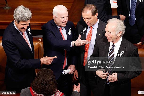 Sen. John Kerry , Sen. John McCain , Sen. Mark Udall and Sen. Joe Lieberman talk before U.S. President Barack Obama's State of the Union address on...