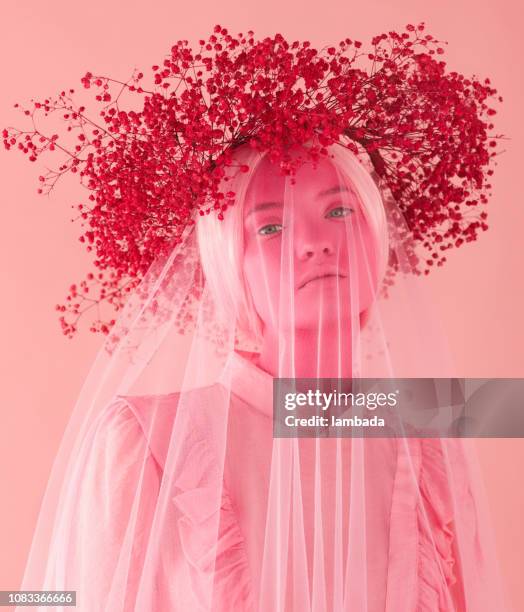 woman with pink skin, pink wreath and clothes - veil stock pictures, royalty-free photos & images