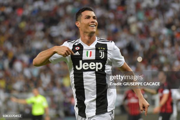 Juventus' Portuguese forward Cristiano Ronaldo celebrates his goal during their Supercoppa Italiana final between Juventus and AC Milan at the King...