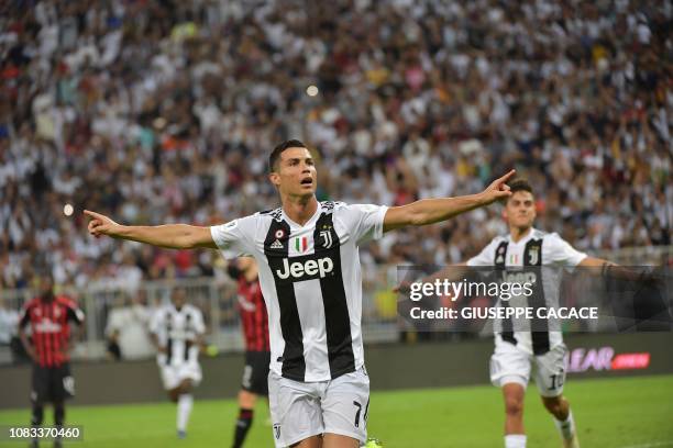 Juventus' Portuguese forward Cristiano Ronaldo celebrates his goal during their Supercoppa Italiana final between Juventus and AC Milan at the King...