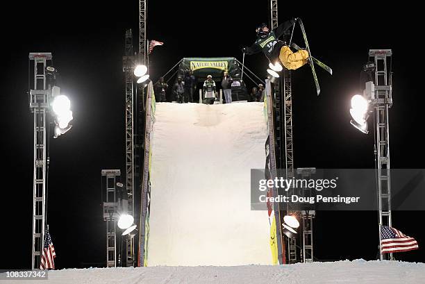 Audan Linnerud of the Full Tilt Boots Team goes airborne during the Nature Valley Challenge Denver Big Air Freestyle Ski Event in Civic Center Park...