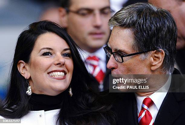 Liverpool co-owner John Henry and his partner Linda Pizzuti arrive before their English Premier League football match against Chelsea at Anfield in...