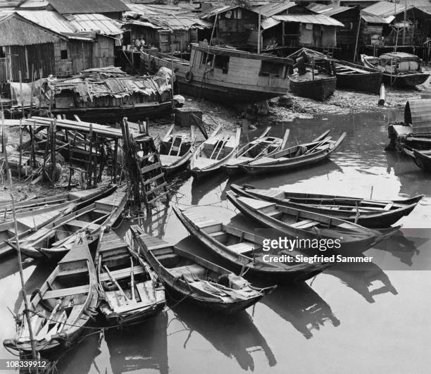 Boats moored on Singapore River, Singapore, circa 1955.