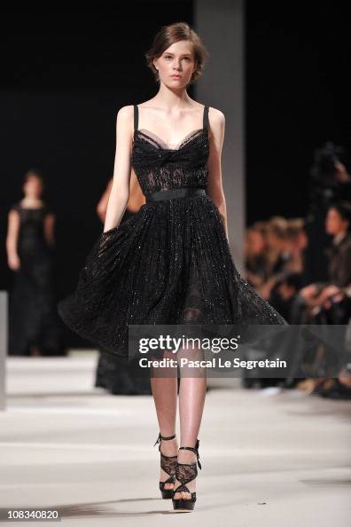 A model walks the runway during the Elie Saab show as part of the ...