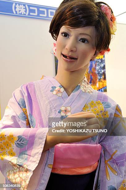 165cm tall humanoid robot "Actroid" wearing a Kimono dress and produced by Japanese robot maker Kokoro, gestures at Sanrio's headquarters in Tokyo,...