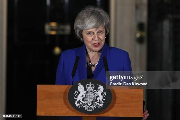 Prime Minister Theresa May addresses the media at number 10 Downing street after her government defeated a vote of no confidence in the House of...