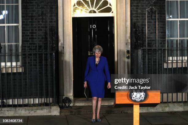 Prime Minister Theresa May walks out to address the media at number 10 Downing street after her government defeated a vote of no confidence in the...