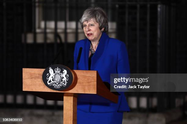 Prime Minister Theresa May addresses the media at number 10 Downing street after her government defeated a vote of no confidence in the House of...