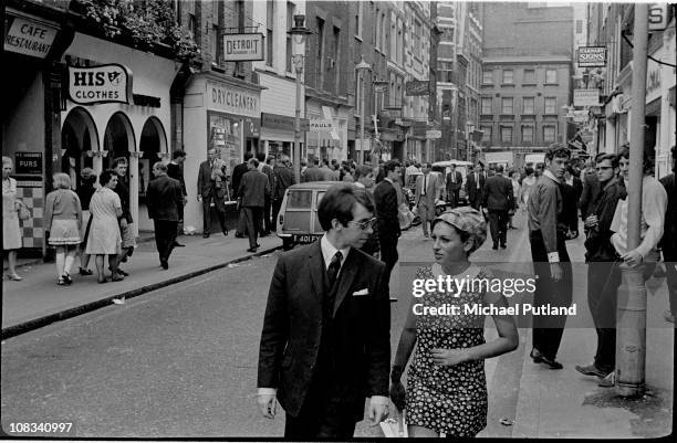 Shoppers on Carnaby Street, London, circa 1965.