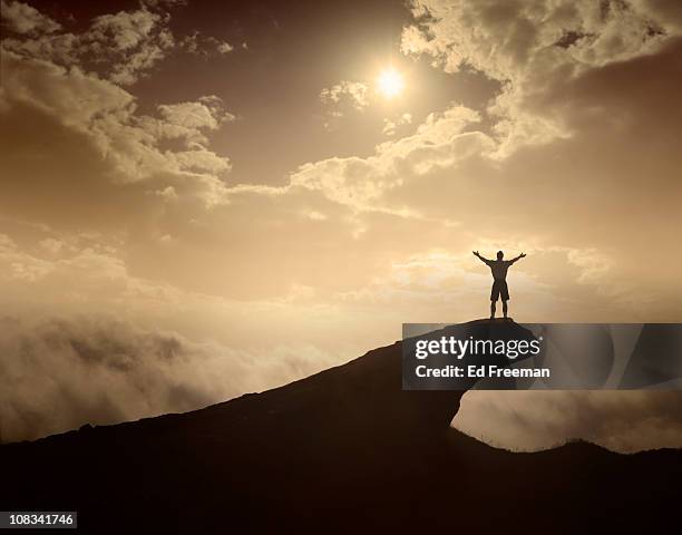 hiker/climber in triumphant pose - champions day one stock pictures, royalty-free photos & images