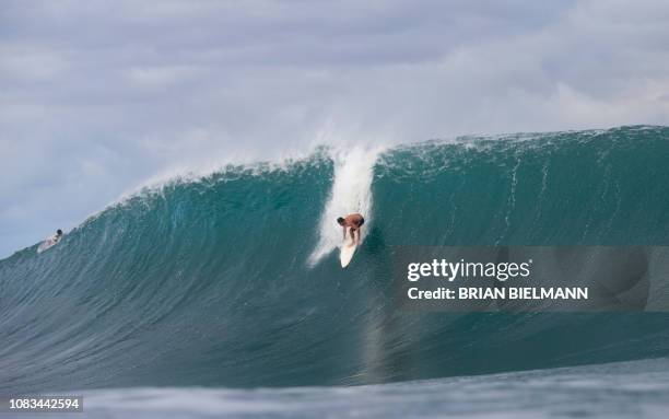 Surfer Bruce Irons competes in Da Hui Backdoor shootout final day at the Pipeline on Oahu's North Shore on January 16, 2019. / Restricted to...