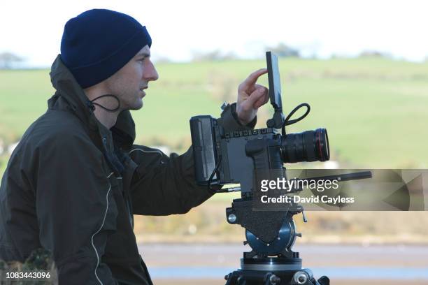 cameraman filming - gifted movie stock-fotos und bilder