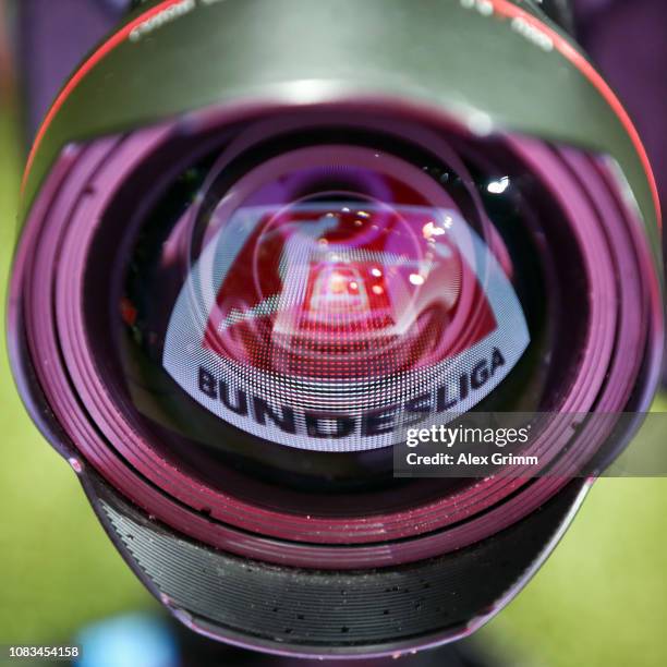 Board showing the Bundesliga logo is reflected in a lens prior to the Bundesliga match between Eintracht Frankfurt and Bayer 04 Leverkusen at...