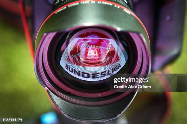 Board showing the Bundesliga logo is reflected in a lens prior to the Bundesliga match between Eintracht Frankfurt and Bayer 04 Leverkusen at...
