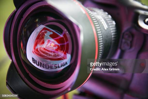 Board showing the Bundesliga logo is reflected in a lens prior to the Bundesliga match between Eintracht Frankfurt and Bayer 04 Leverkusen at...