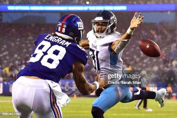 Kevin Byard of the Tennessee Titans breaks up a pass to Evan Engram of the New York Giants during the fourth quarter of the game against the New York...