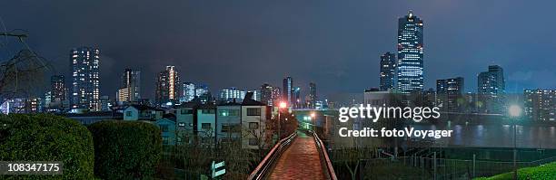 tokyo night city neon lights illuminated skyscraper cityscape panorama japan - tokyo japan night alley stock pictures, royalty-free photos & images