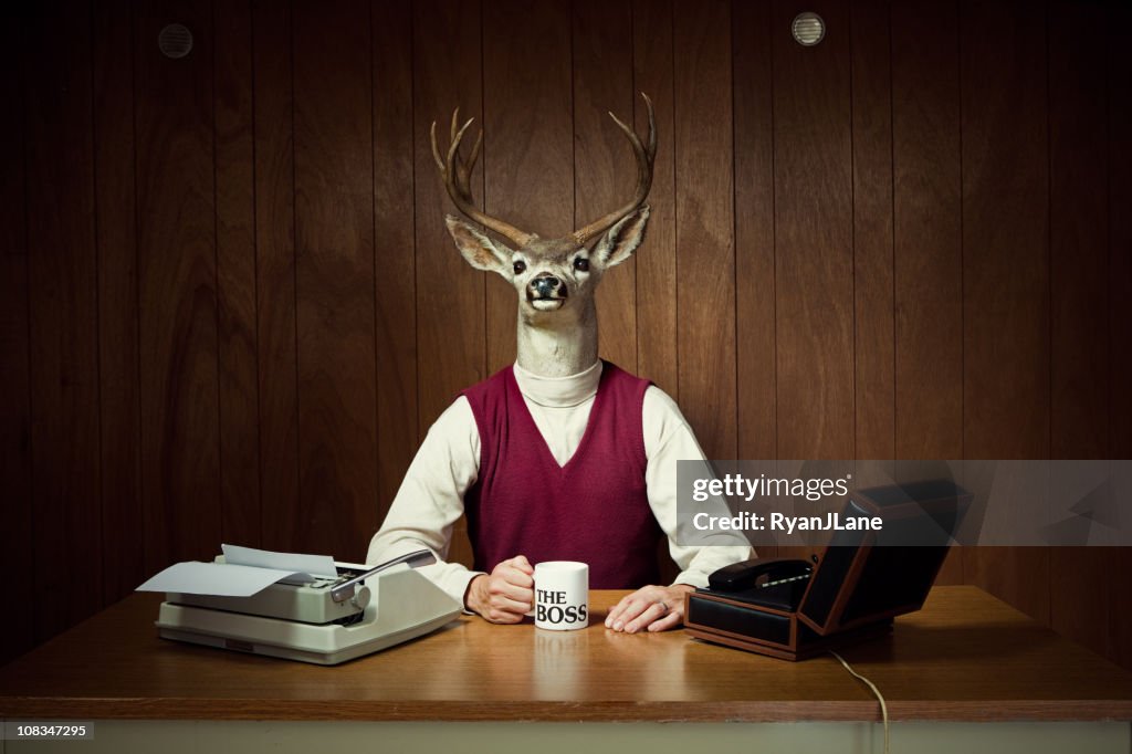 Deer CEO at His Desk