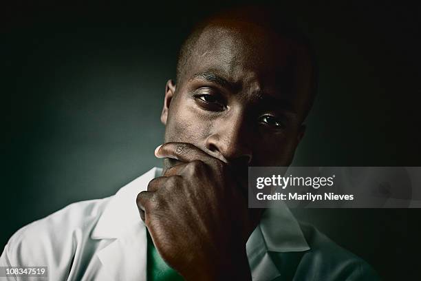 face of a weary doctor - crying portrait stock pictures, royalty-free photos & images