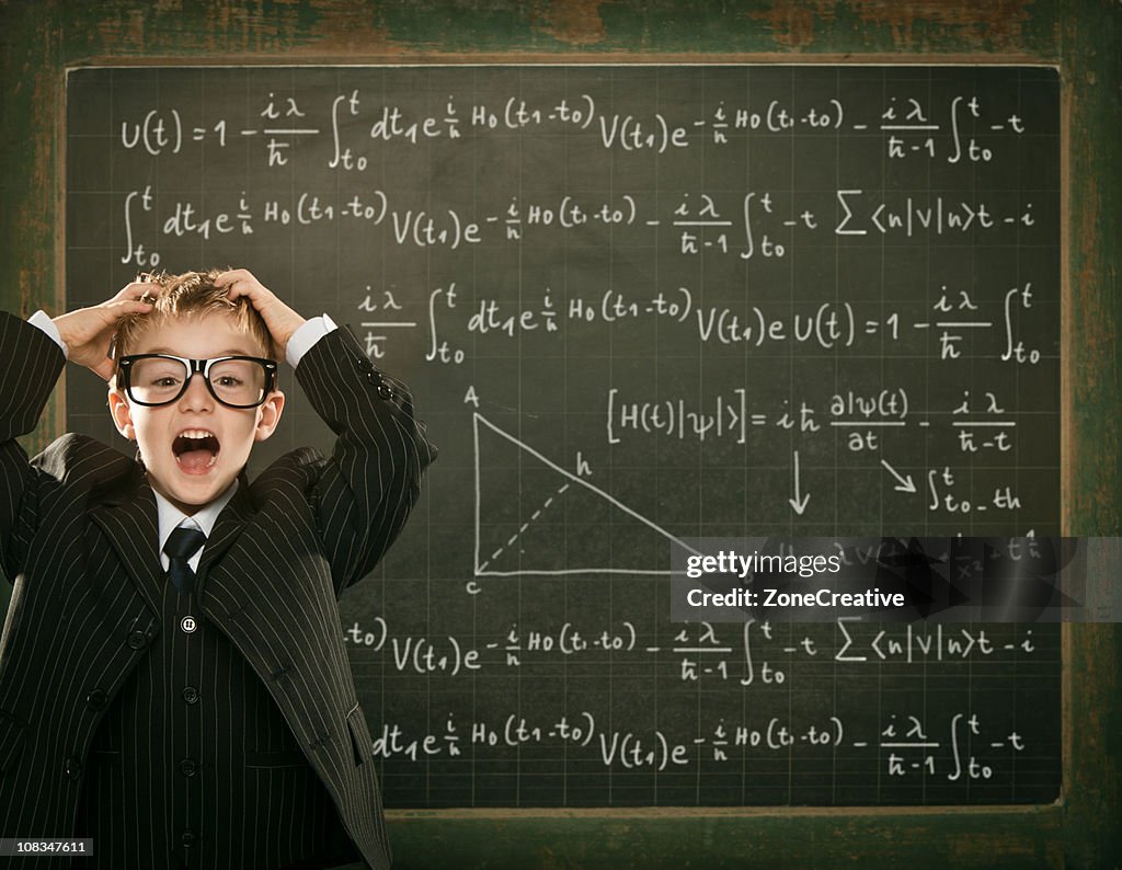 Desperate young clever science student with formula written blac