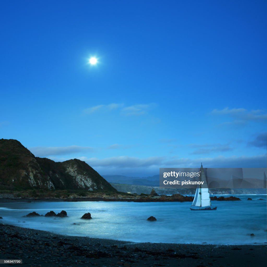 Sail boat in night bay