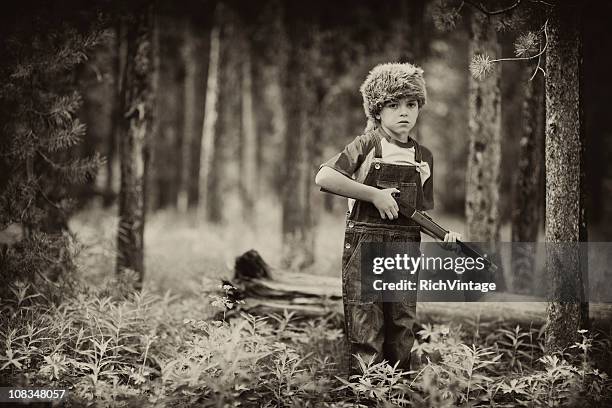 young hunter - toy gun stock pictures, royalty-free photos & images