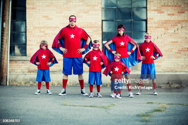 family of superheroes - stage costume stock pictures, royalty-free photos & images