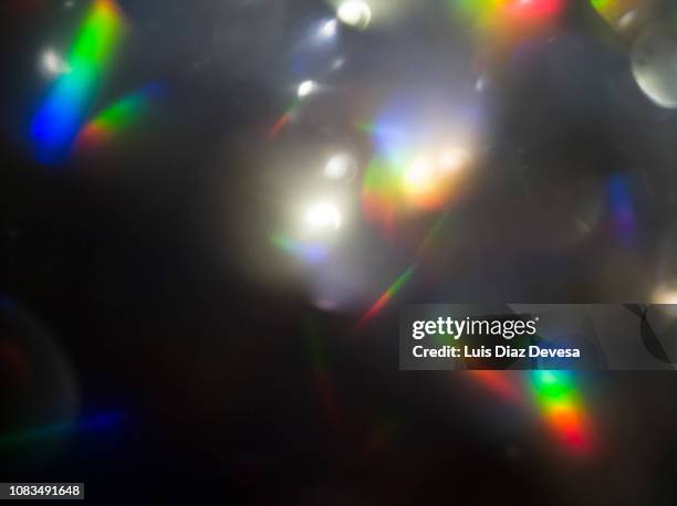 christmas bauble in  christmas tree - rainbow lens flare stock pictures, royalty-free photos & images