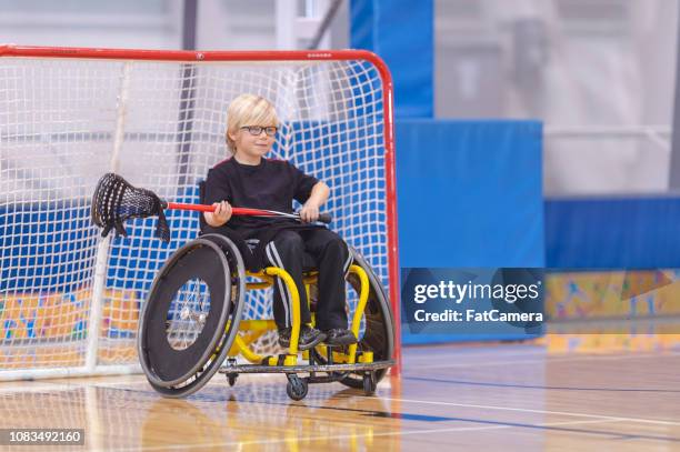 goaltender in a wheelchair - crosier stock pictures, royalty-free photos & images