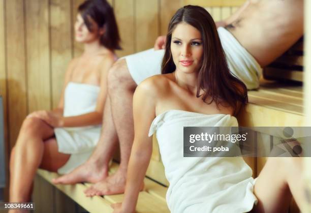 young girls and boy enjoying sauna - young boy in sauna stock pictures, royalty-free photos & images